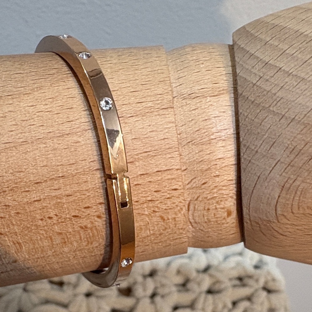 Elegant Gold Bangle with Crystals - Picture 4 of 14